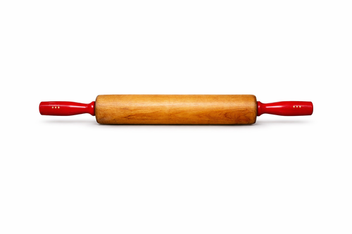 Wooden rolling pin with red handles on a white background