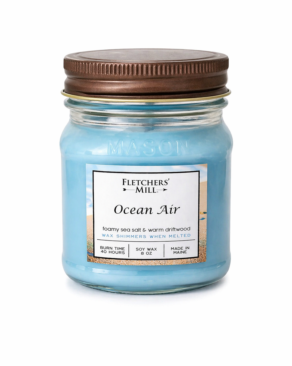 Fletchers Mill Ocean Air candle in a glass jar with a brown lid on a white background