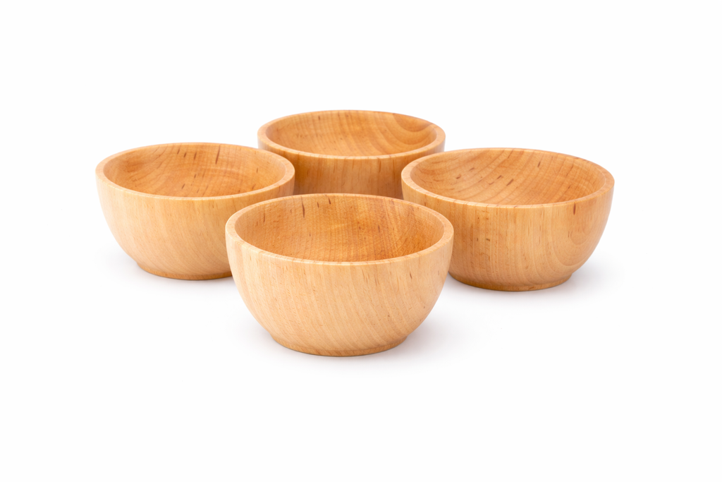 Four wooden bowls on a white background